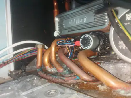 The inside of a Vaillant boiler showing the pipework and heat exchanger