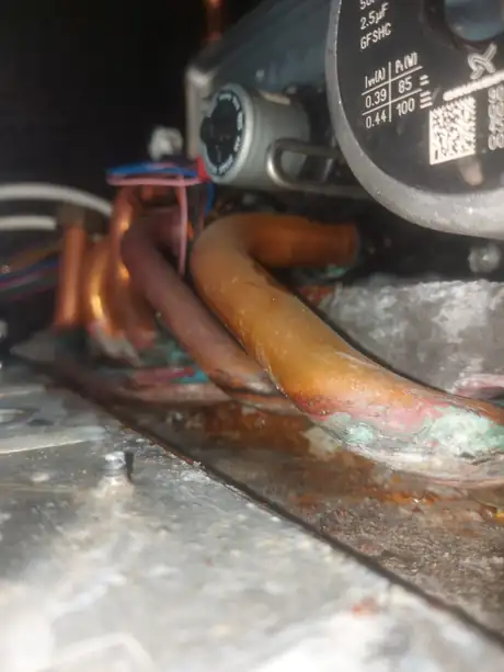 The corroded base inside an opened boiler