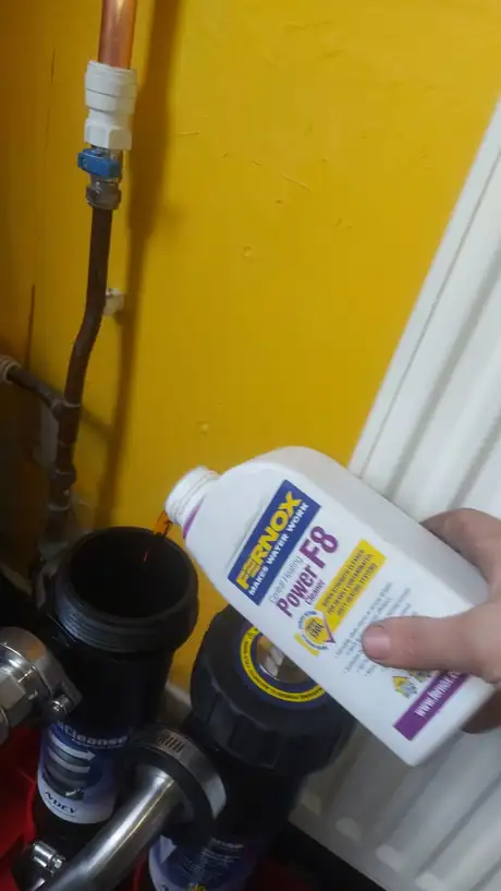 Cleaning chemical being added through a system filter