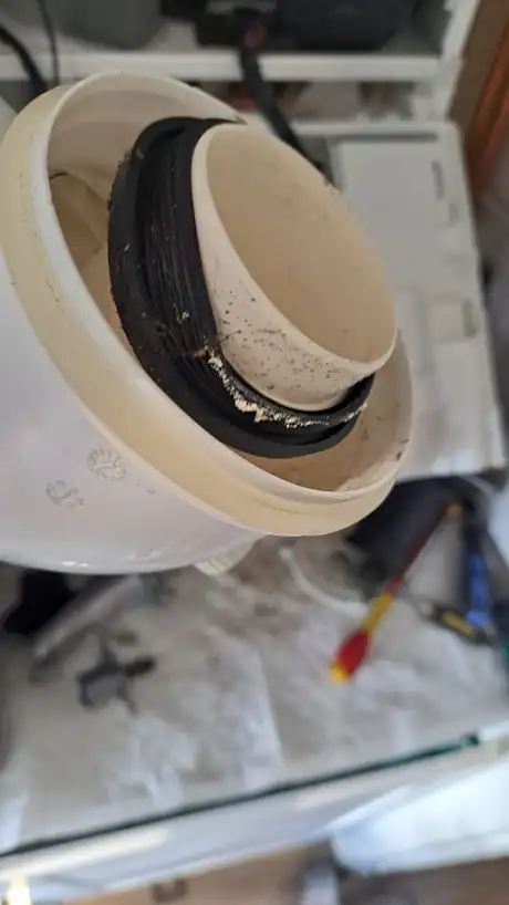 A perished flue seal inside a flue section