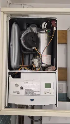 The inside of a boiler casing, open for a repair