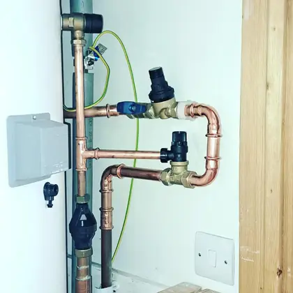 A pressure reducing valve and expansion relief valve on new copper pipework